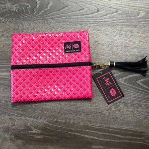 New with tags pink makeup junkie bag in size small